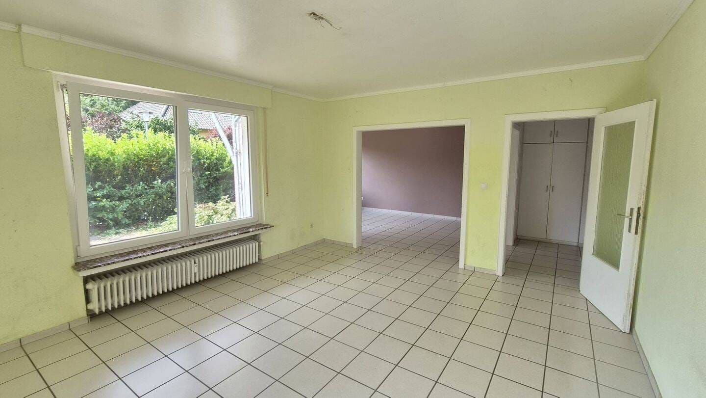 Immobilie in Bad Iburg - Attraktives Zweifamilienhaus auf Eigentumsgrundstück in naturnaher Lage von Bad Iburg - Bild 1