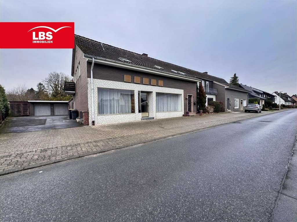 Immobilie in Ennigerloh - Gepflegtes Wohn- und Geschäftshaus mit integrierter Gewerbeeinheit
 - Bild 0