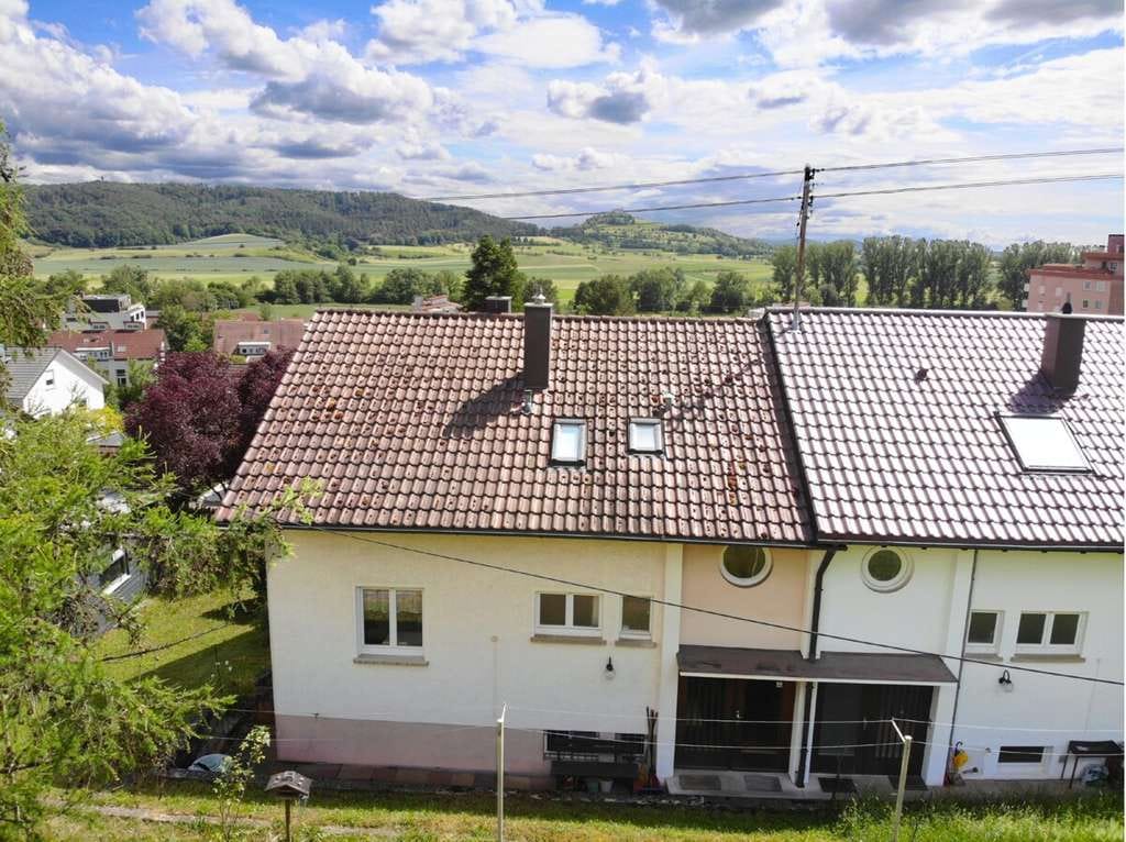 Immobilie in Tübingen - Wohnen mit Aussicht – bezugsfreie Doppelhaushälfte mit Einliegerwohnung und großem Potenzial - Bild 2