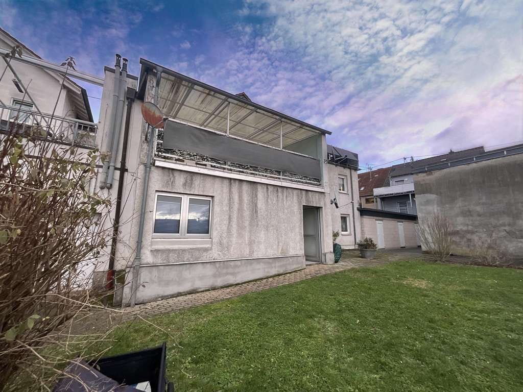 Immobilie in Saarwellingen - Gepflegtes Mehrfamilienhaus mit sechs Wohnungen in zentraler Lage von Saarwellingen - Bild 1