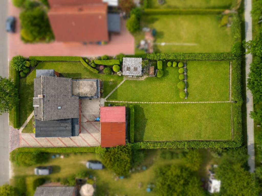 Immobilie in Großefehn - Charmantes Siedlerhaus in Ostgroßefehn – großes Grundstück & Nebengebäude! - Bild 1