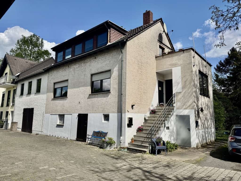 Immobilie in Unkel - Zwei Einfamilienhäuser in Unkel,  Rheinnähe - großes Grundstück  - 11 Stellplätze - Bild 1