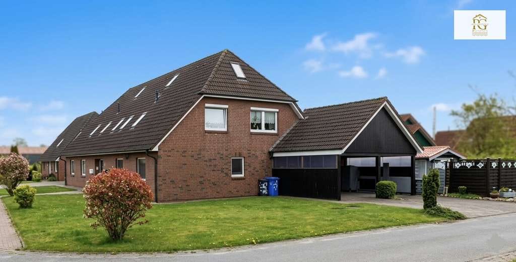 Immobilie in Neuenkirchen - Gepflegte Eigentumswohnung mit Terrasse und Gartenhaus in einem gepflegtem Mehrfamilienhaus in Neuen - Bild 0