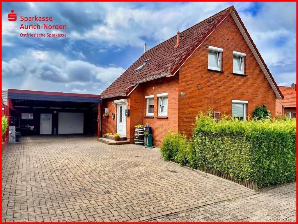 Immobilie in Upgant-Schott - Gemütliches Einfamilienhaus auf großem Grundstück mit Garage, Carport und PV-Anlage in Upgant-Schott - Bild 0