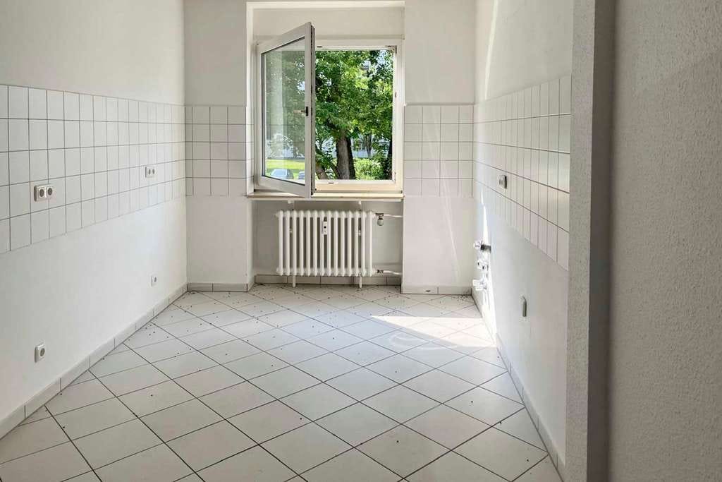 Immobilie in Dinslaken - Paketverkauf - Zwei bezugsfreie 3-Zimmer-Whg mit zwei Reihengaragen - Bild 3
