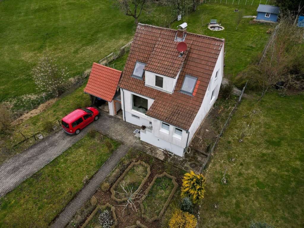 Immobilie in Schlüchtern - Modernisiert & Wohlfühlcharakter: Einfamilienhaus mit großem Garten in Schlüchtern-Hutten - Bild 0