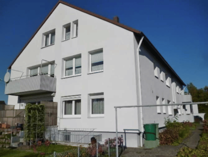 Immobilie in Hameln - Gebotsverfahren: Erdgeschosswohnung (Erbbau) mit Garage in Hameln, OT Afferde - Bild 1