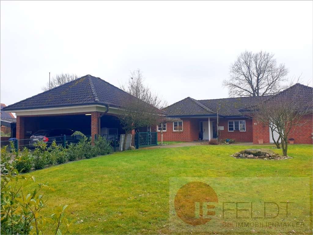 Immobilie in Kattendorf - Idyll am Rande Hamburgs: Ebenes Wohnhaus mit wertiger Ausstattung, Carport + Garten mit Ausblick - Bild 0