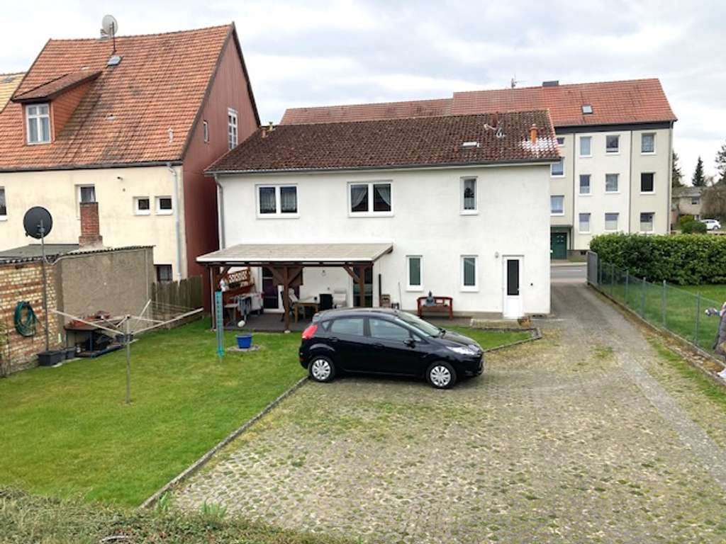 Immobilie in Goldberg - Kleines Stadthaus mit zwei Mietwohnungen, Gewerbefläche und großzügigem Grundst - Bild 3