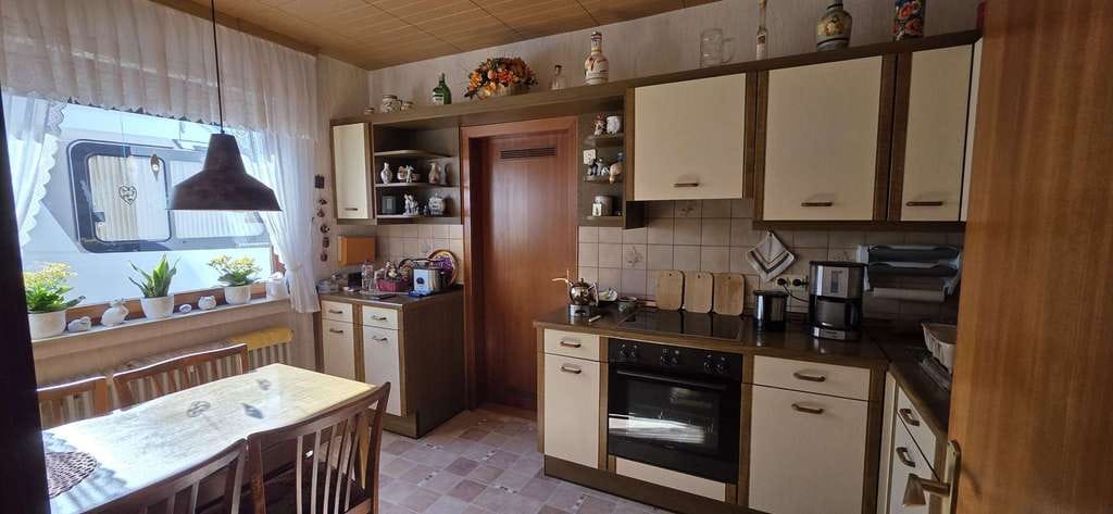 Immobilie in Weener - Solides Flachdachhaus mit Gartenidylle in angenehmer Wohnlage - Bild 3