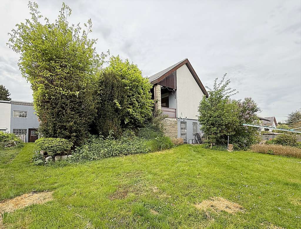 Immobilie in Friolzheim - Großzügiges Einfamilienhaus / Bungalow mit Einliegerwohnung und Garten in Friolzheim - Bild 1