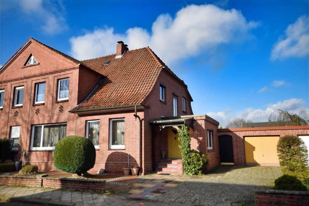 Immobilie in Diepholz -  Doppelhaushälfte im Stadtzentrum von Diepholz
 Backsteinbau mit schönem Garten - Bild 0