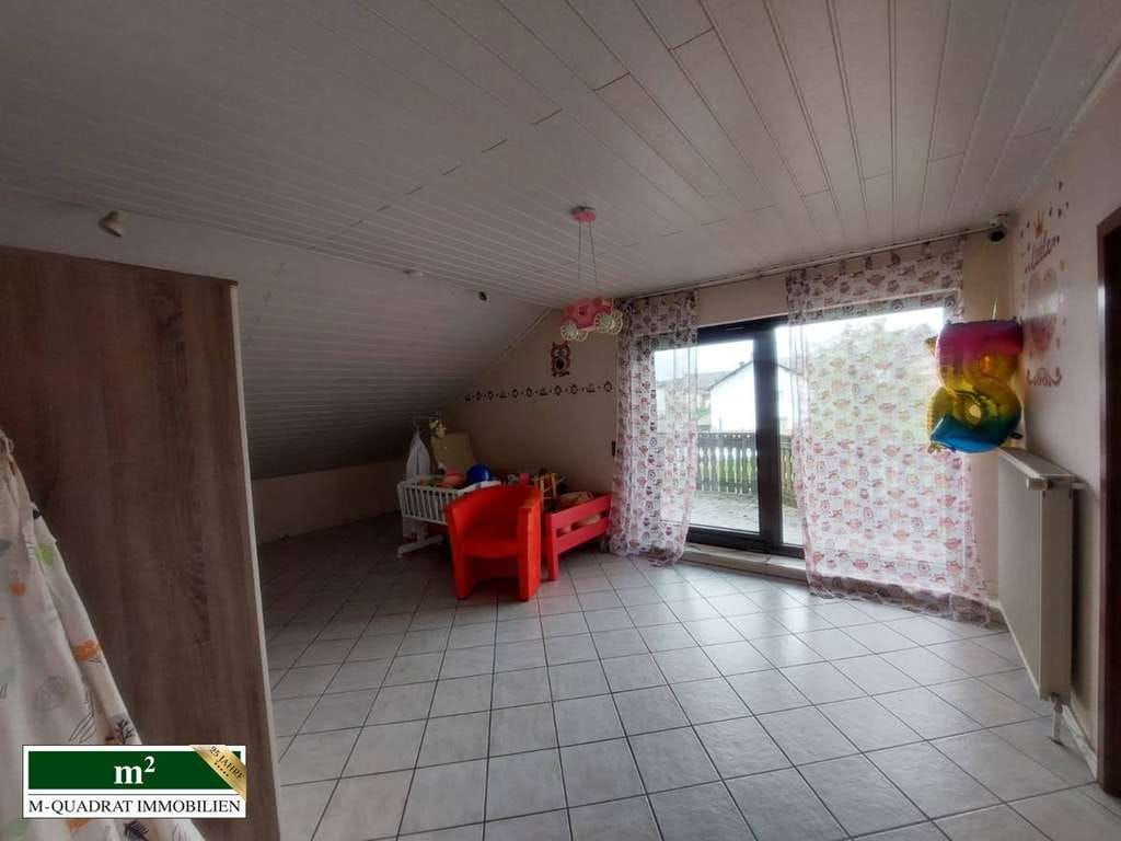 Immobilie in Scheidt - Familienfreundliches Einfamilienhaus in guter Lage - Bild 3