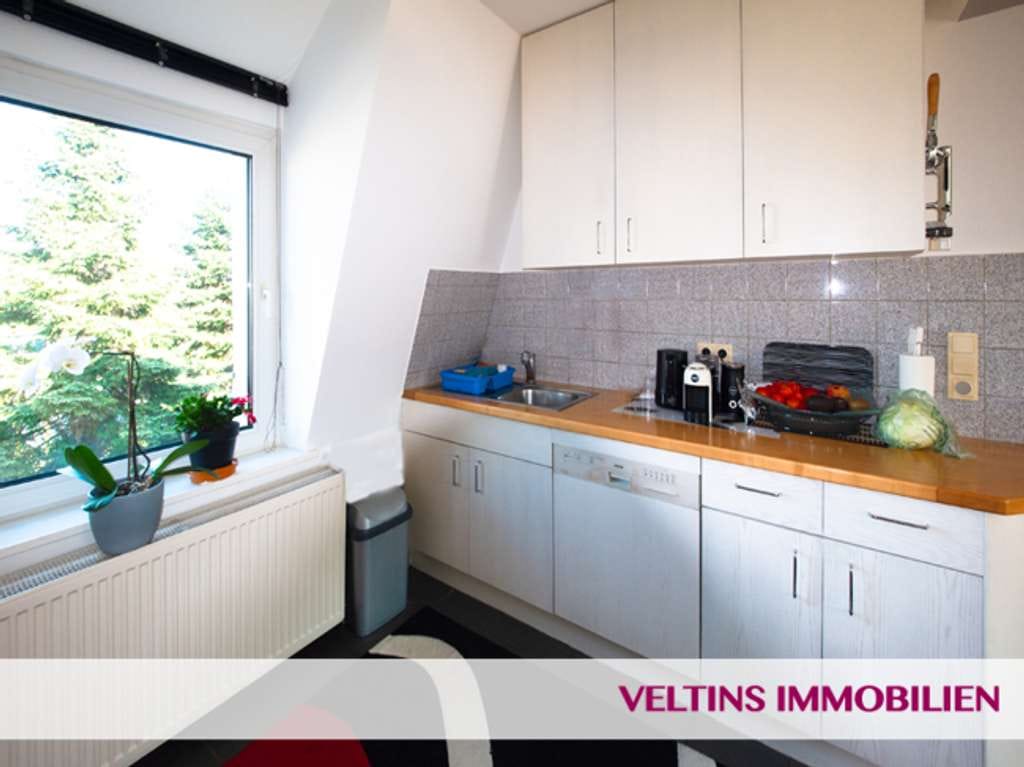 Immobilie in Frankfurt am Main - F-Hausen: Helle, sanierte  Single-Wohnung mit Gartennutzung, Einbauküche nahe U-Bahnstation - Bild 2