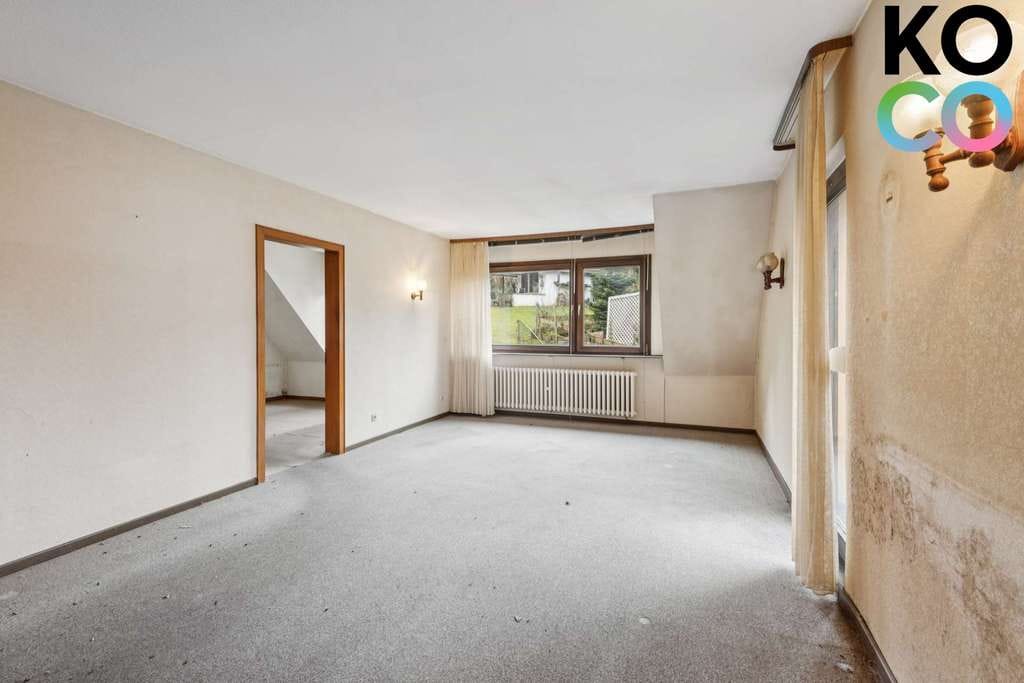 Immobilie in Heiligenhaus - Dreifamilienhaus mit großem Garten, Garage & Ausbaupotenzial–attraktive Gelegenheit in Heiligenhaus - Bild 1