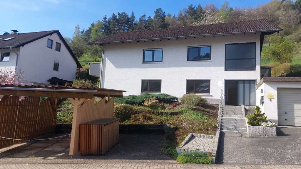 Immobilie in Heimbuchenthal - Idyllisches 1-FMH mit ELW  im Herzen des Spessarts – Perfekt für Familien & Generationenwohnen - Bild 0