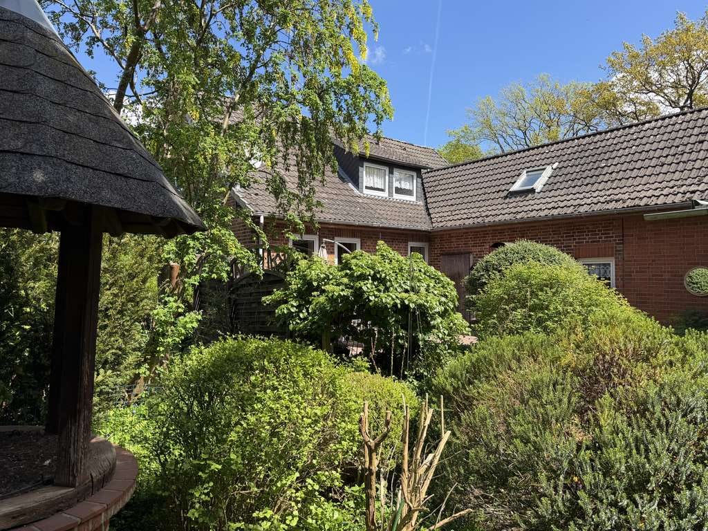 Immobilie in Schiffdorf - Familienhaus gesucht? Gefunden! Hübsches Rotsteinhaus mit parkähnlichem Grundstück in Schiffdorf-Weh - Bild 2
