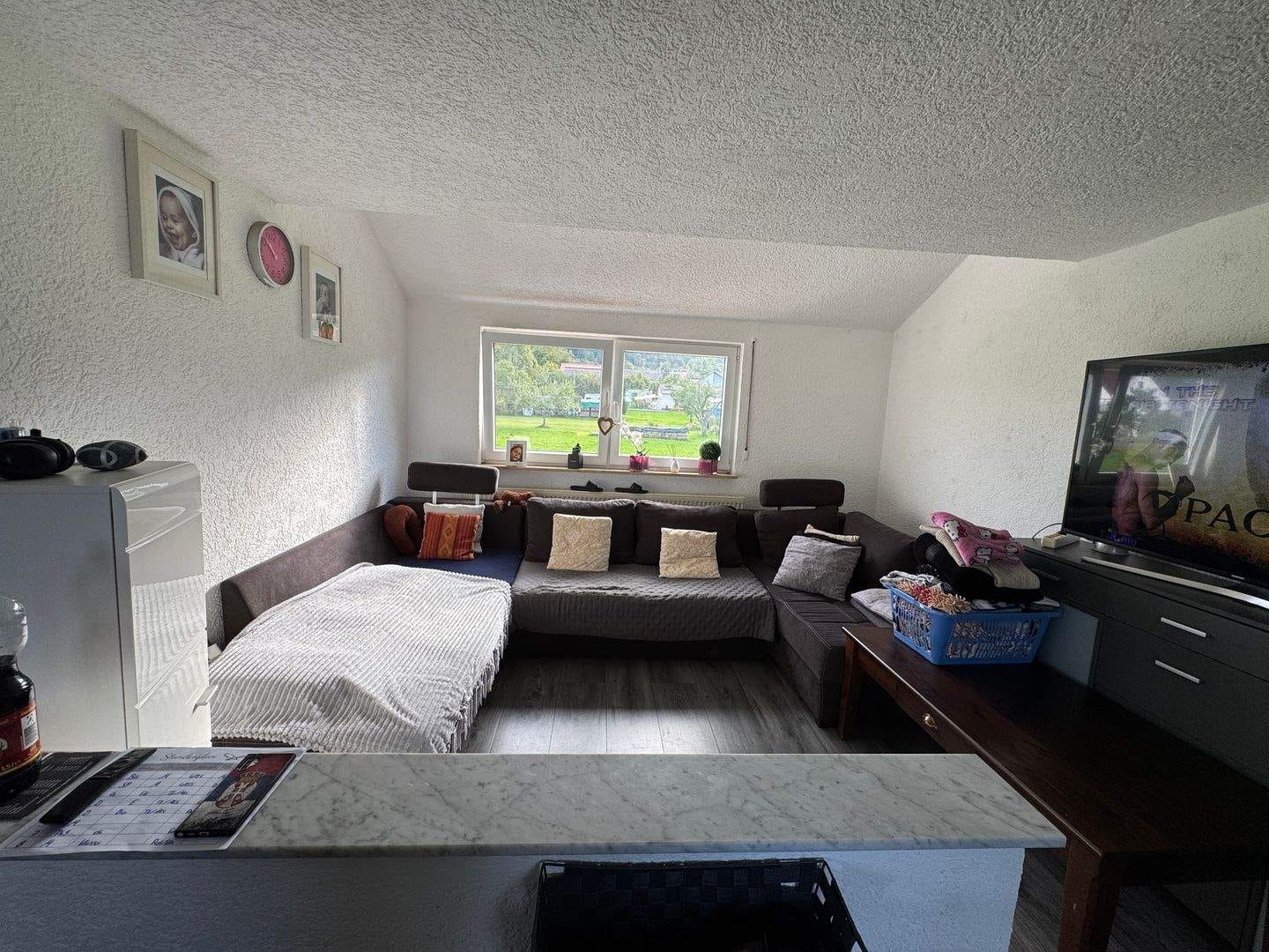 Immobilie in Deilingen - 3-Zimmer-Dachgeschosswohnung mit Einbauküche, Stellplatz und Blick ins Grüne - Bild 0