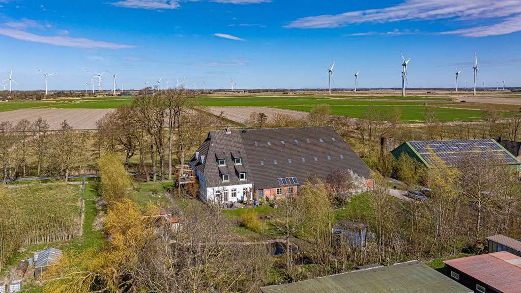 Immobilie in Helse - Vollständig vermietetes Landhaus im ruhigen Herzen Dithmarschens | Parkähnliches Grundstück - Bild 1