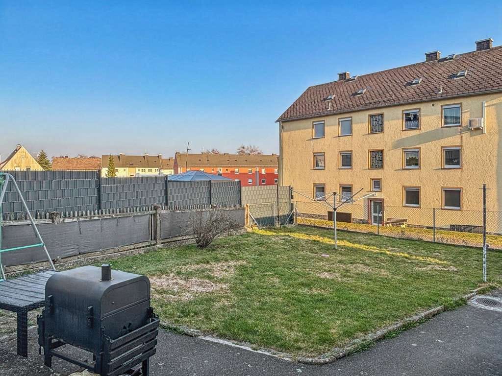 Immobilie in Helmbrechts - Attraktive Wohnimmobilie als Renditeobjekt – Vermietete Doppelhaushälfte in Helmbrechts - Bild 1