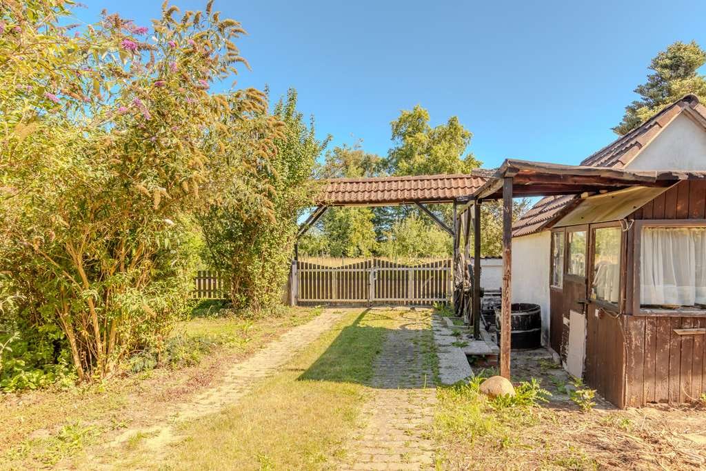 Immobilie in Schnackenburg - Einfamilienhaus mit Gartenhaus und zwei Garagen in Elbnähe - Bild 4
