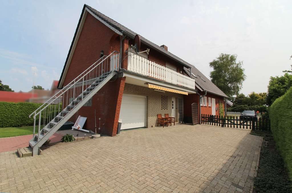 Immobilie in Westoverledingen - Großzügiges und gepflegtes Wohnhaus mit schönem Grundstück und unverbaubarem Blick ins Grüne! - Bild 3