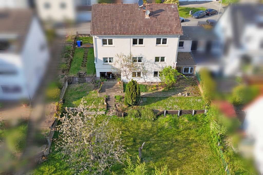 Immobilie in Kelkheim - Mehrfamilienhaus mit Bauplatz in Ruppertshain - Bild 0