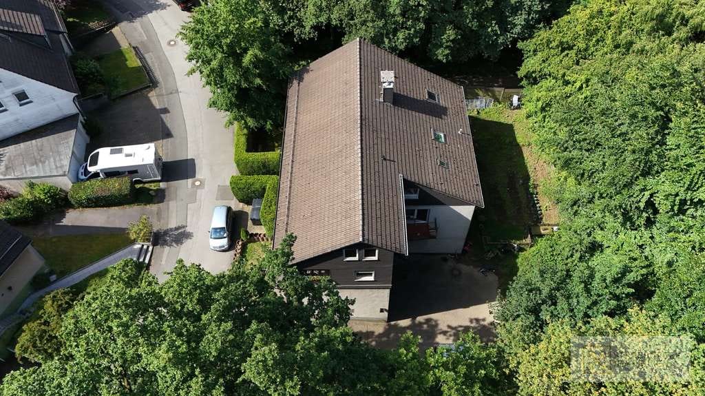 Immobilie in Wermelskirchen - Gepflegtes Vierparteienhaus mit Mietsteigerungspotential in ruhiger Waldrandlage von Wermelskirchen - Bild 2