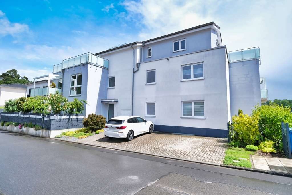 Immobilie in Eppertshausen - Stilvolle 2-Zimmer-Wohnung in exklusiver Waldrandlage – mit Privatgarten, Terrasse & 2 Stellplätzen. - Bild 0