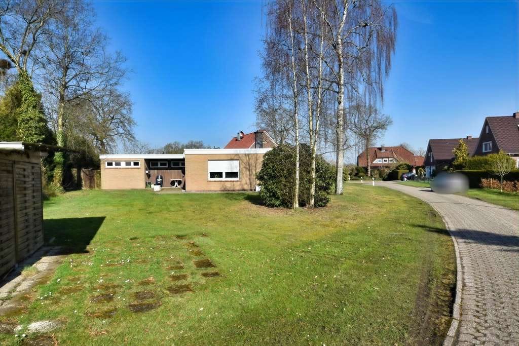 Immobilie in Großefehn - NEUER PREIS - Modernisierter Flachdachbungalow in Großefehn - Bild 1