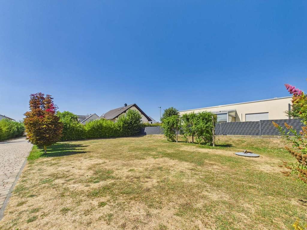 Immobilie in Echzell - - Wohntraum - KfW-70-Haus mit Kamin, PV-Anlage und 927 m² Grundstück in Ruhiger Lage von Echzell - Bild 4
