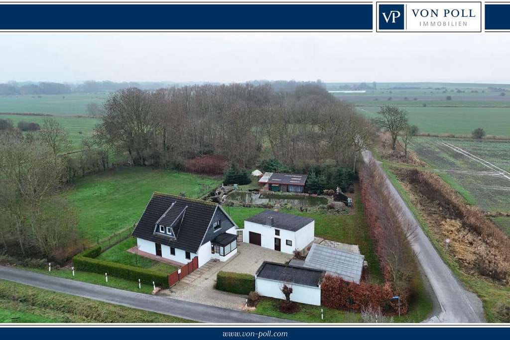 Immobilie in Wurster Nordseeküste - Freistehendes Einfamilienhaus hinter dem Deich – mit großem Grundstück und viel Potenzial - Bild 0