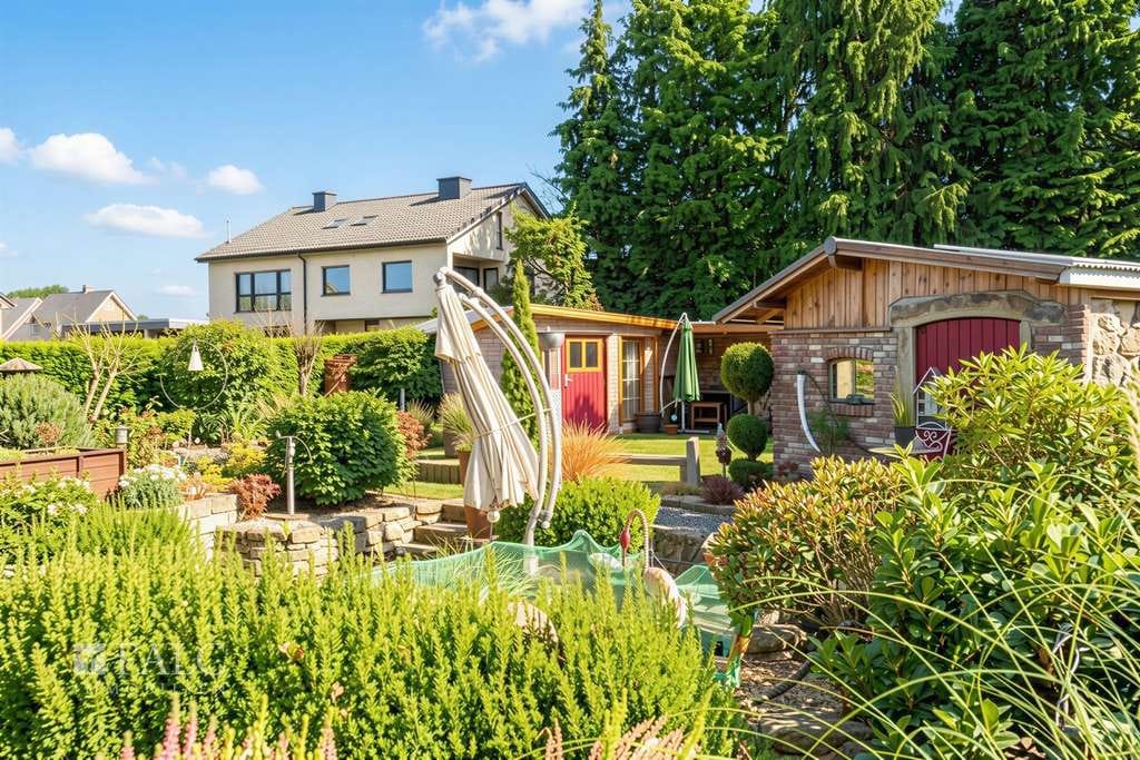 Immobilie in Saerbeck - Zwei Wohnwelten unter einem Dach! Freistehendes Einfamilienhaus mit Einliegerwohnung - Bild 2