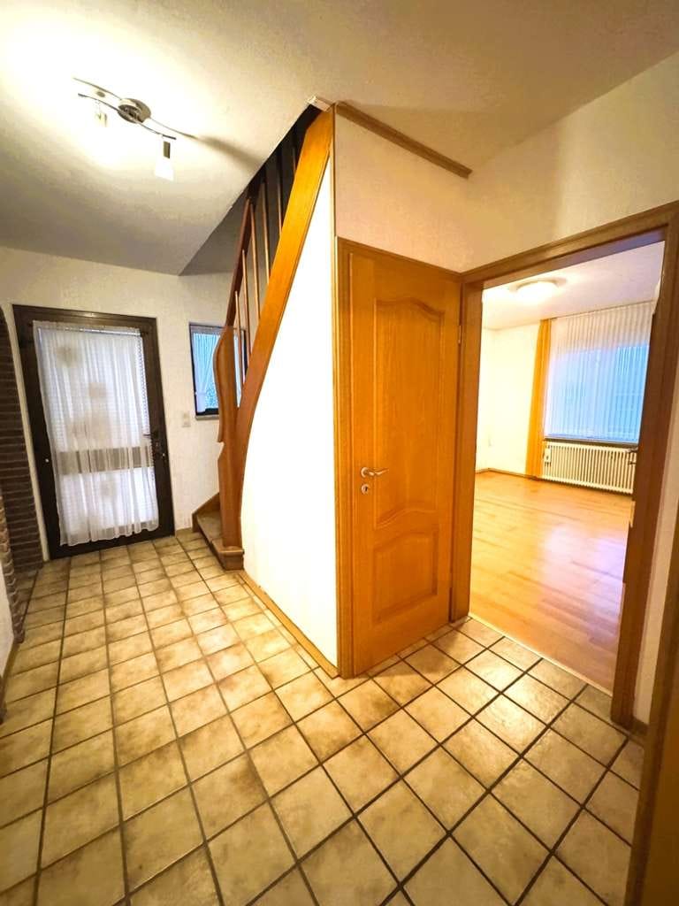 Immobilie in Krummhörn - Gepflegt und küstennah: Einfamilienhaus mit Wintergarten, Garage und Garten - Bild 1
