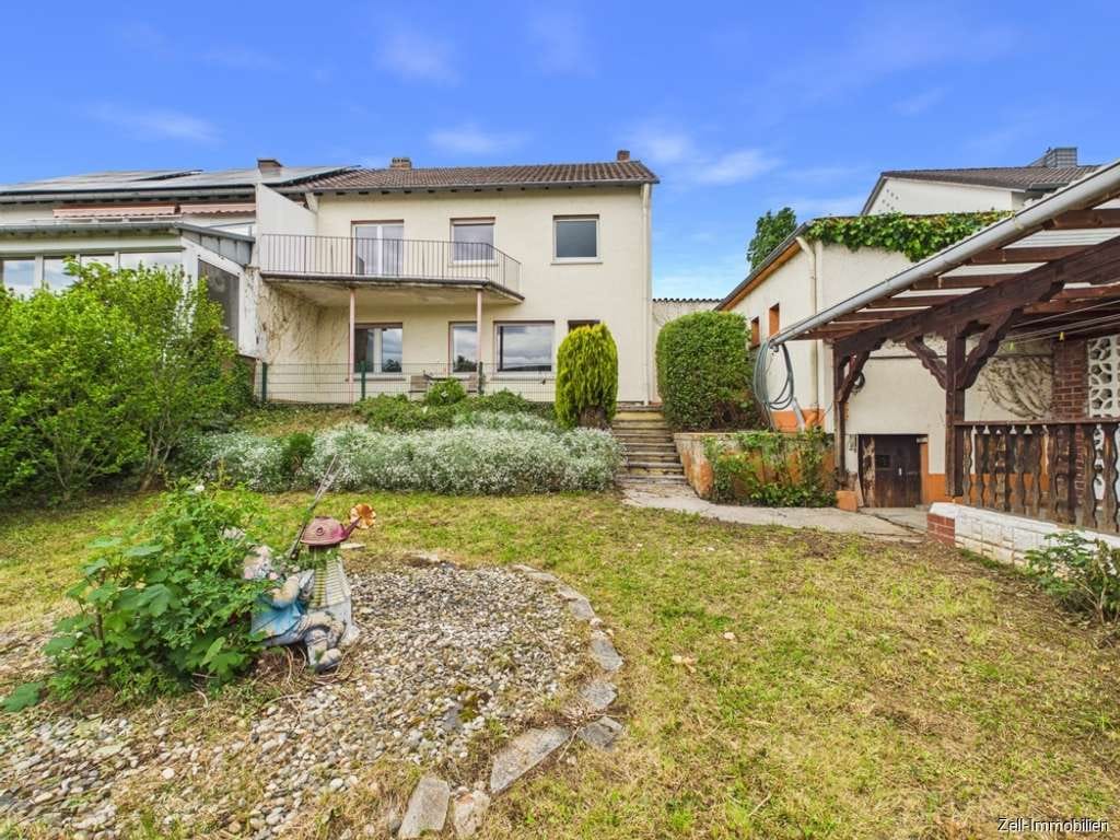 Immobilie in Rüdesheim am Rhein - Familienfreundliche Doppelhaushälfte mit Garten, Terrasse und Garage - Bild 1