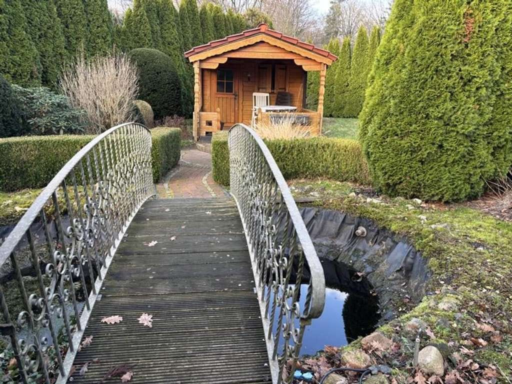 Immobilie in Dötlingen - Junger Bungalow mit Ausbaureserve in Nuttel - Bild 1