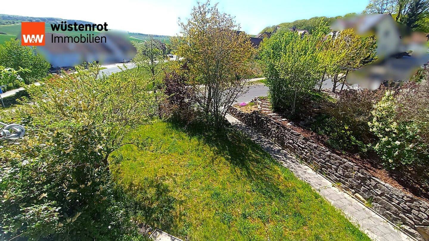 Immobilie in Maßbach - Traumhafte Aussicht trifft Flexibilität - Ihr Zuhause mit Einlieger- & Zweifamilienoption - Bild 4