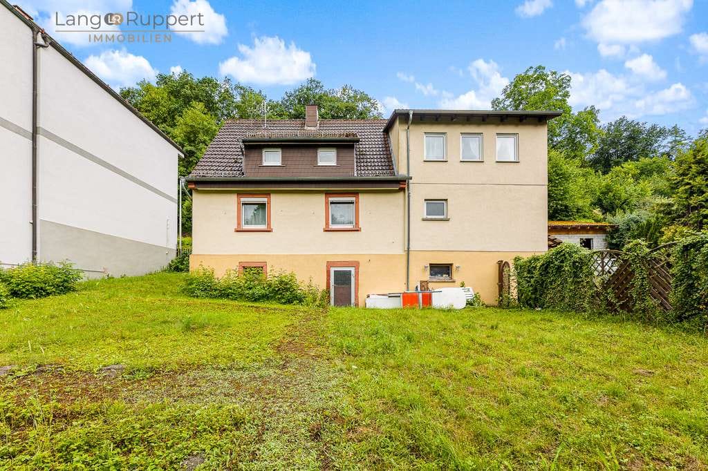 Immobilie in Wald-Michelbach - Familienfreundliches Wohnen mit Garten, Garage und Entwicklungspotenzial - Bild 2