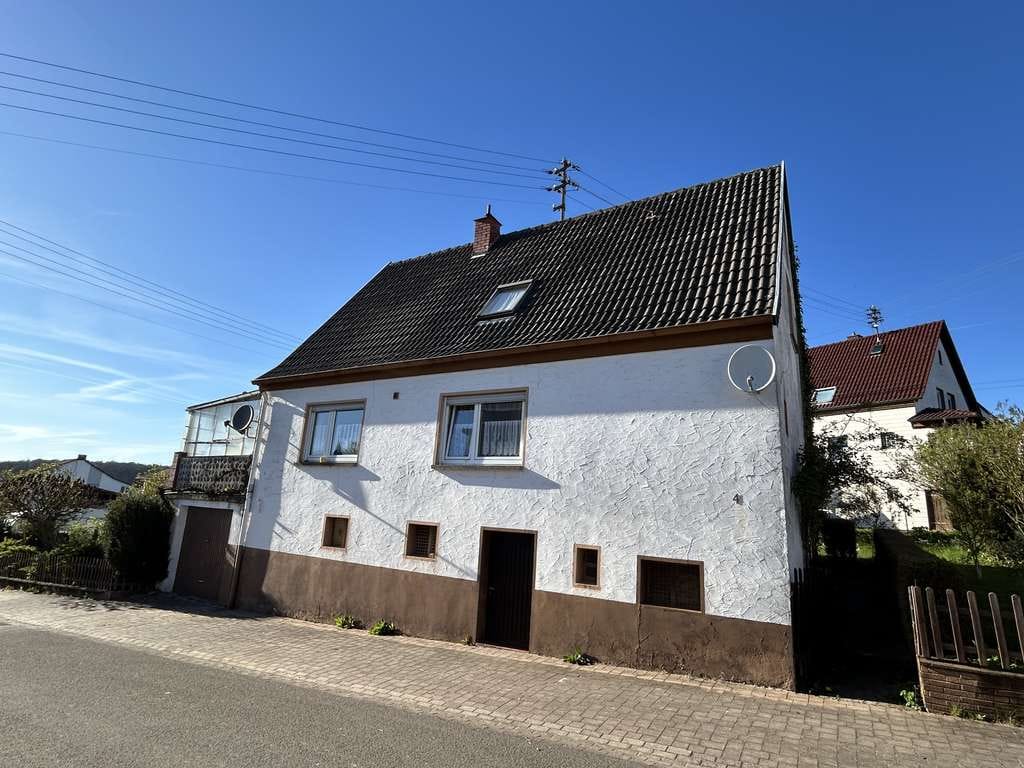 Immobilie in Reifenberg - Charmantes Einfamilienhaus mit großem Grundstück & Potenzial in 66507 Reifenberg - Bild 0