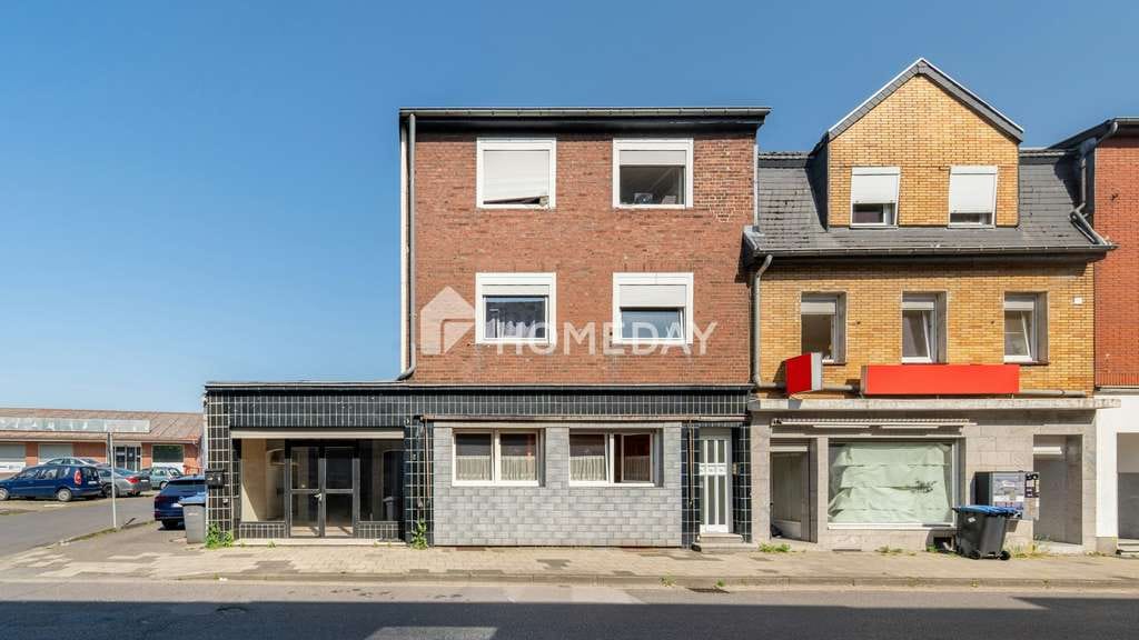 Immobilie in Alsdorf - Solides Mehrfamilienhaus mit freier Gewerbefläche, Terrasse, Balkon und Stellplätzen in Alsdorf - Bild 0