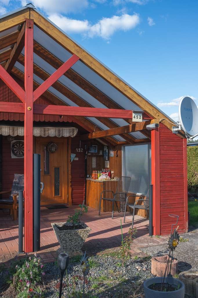 Immobilie in Sassenburg - Charmantes Blockhaus am Bernsteinsee | 3 Zimmer | 511 m² Grundstück - Bild 1