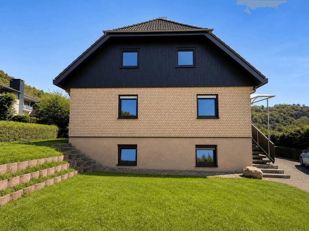 Immobilie in Hahnenbach - Großzügiges Wohnen mit Stil und moderner Technik– modernisierte Doppelhaushälfte in naturnaher Lage - Bild 1