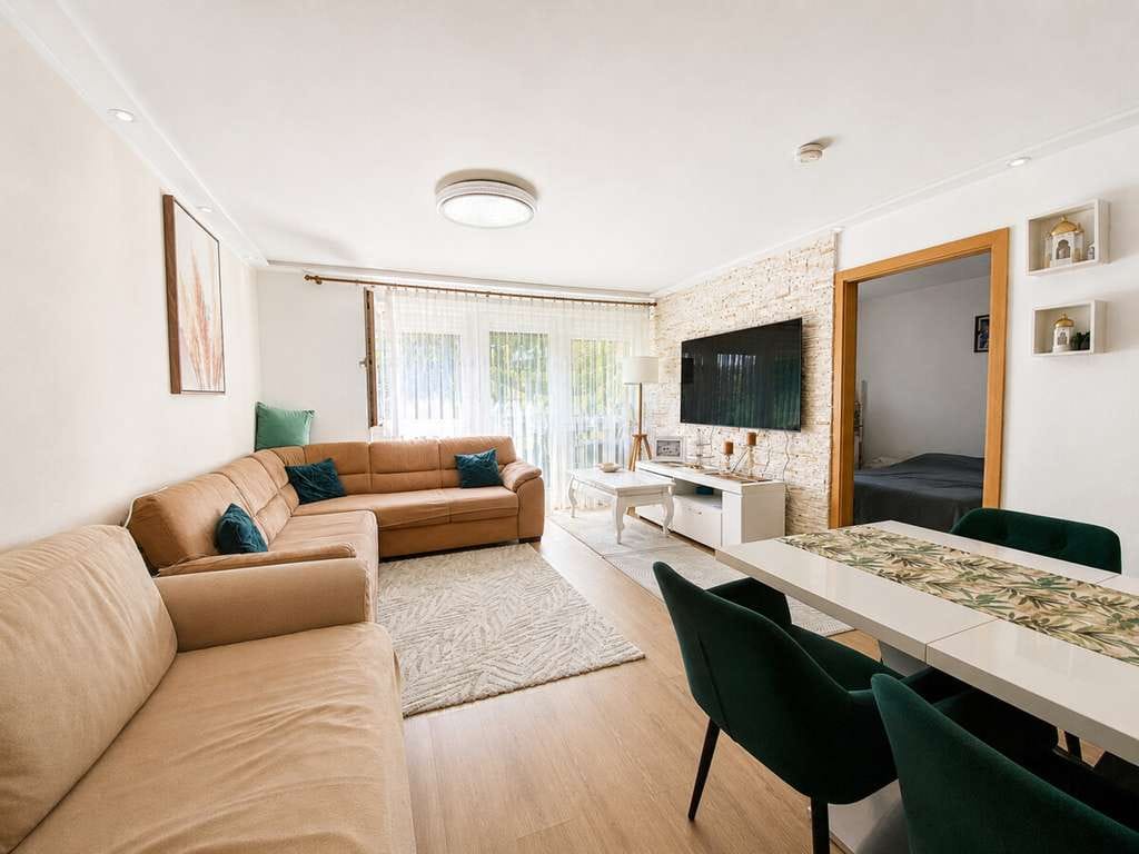 Immobilie in Güglingen - Gepflegte 3-Zimmer-Wohnung mit gemütlichem Balkon, Außen- und Tiefgaragenplatz & schöner Außenanlage - Bild 3
