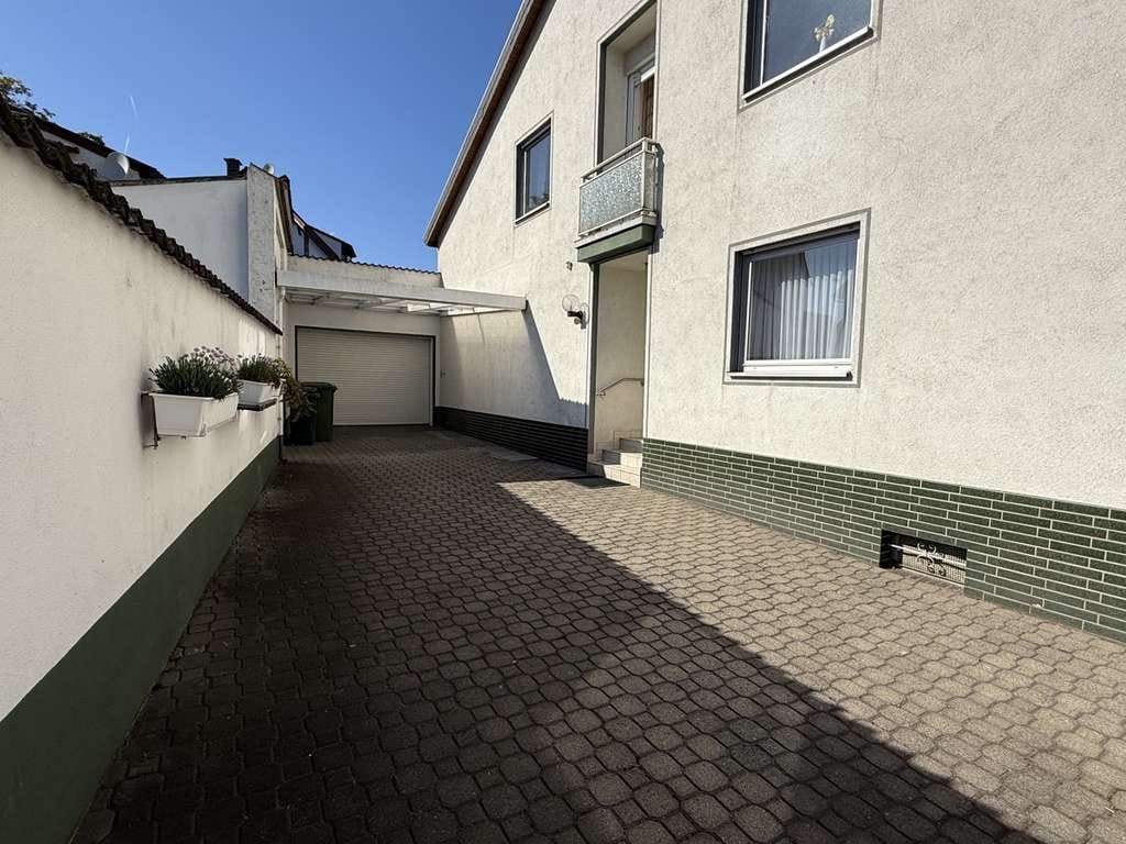 Immobilie in Nidderau - Viel Platz für die große Familie - Raumwunder mit tollem Außenbereich - Bild 3
