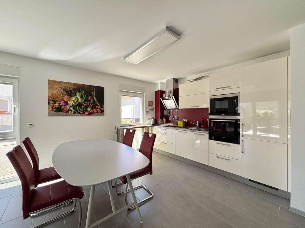 Immobilie in Minfeld - Barrierefreie Erdgeschosswohnung mit Terrasse und zwei Stellplätzen - Bild 1