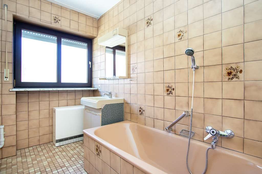 Immobilie in Trochtelfingen - Ideal für Eigennutzer oder Investoren, Zweifamilienhaus mit Gewerbeeinheit und Garten - Bild 3