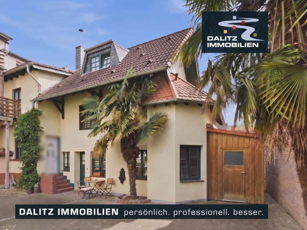 Immobilie in Bornheim - Südländisches Ambiente auf 3 Ebenen - Bild 0