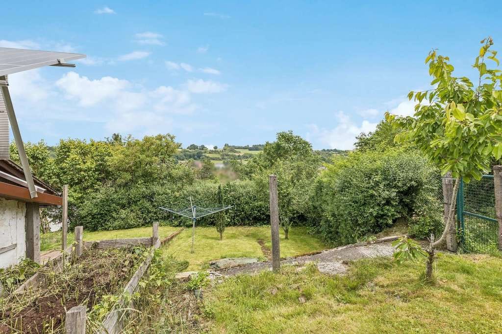 Immobilie in Mücke - Großzügiges Einfamilienhaus mit Einliegeroption und Garten in idyllischer Feldrandlage - Bild 3