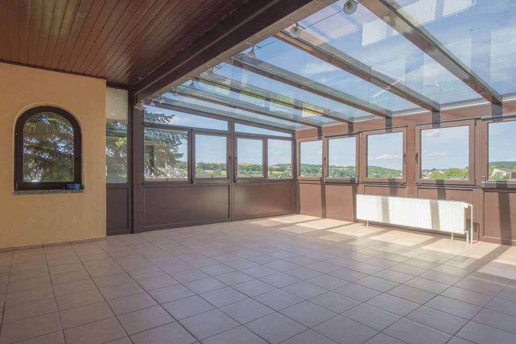 Immobilie in Grävenwiesbach - Wintergarten, Blick, Gartenpool, PV, viel Platz für die Familie - großes EFH oder Generationenhaus - Bild 0