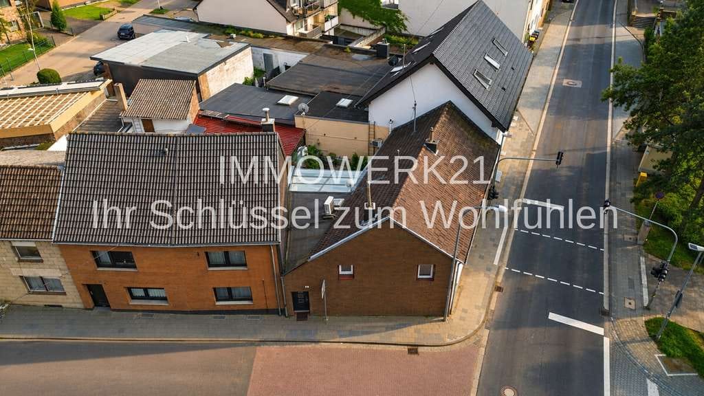 Immobilie in Weilerswist - Modernisiertes Einfamilienhaus mit Wintergarten - Bild 1